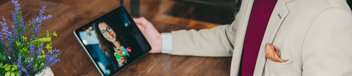 man holding ipad