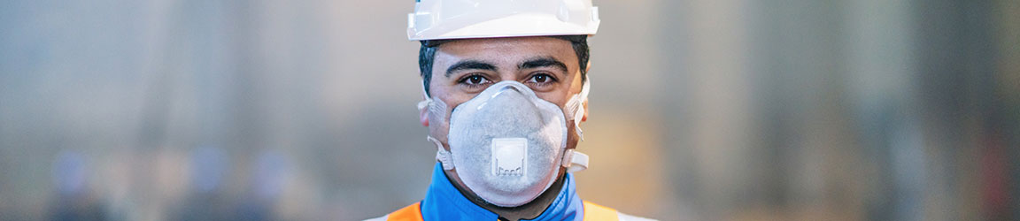 construction worker wearing a mask