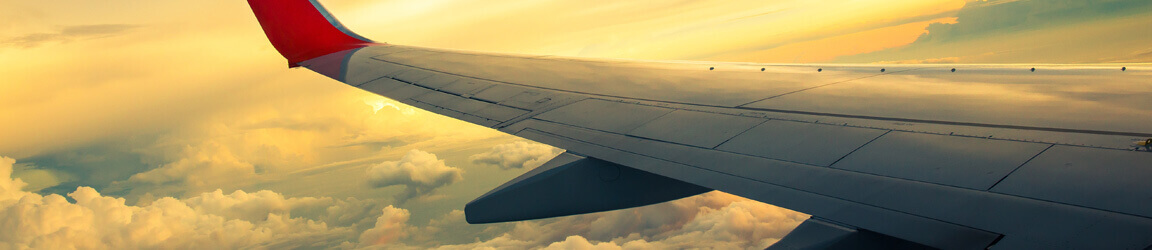 plane flying through clouds